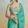 Lustrous Sea Green Cotton Silk Saree With Proficient Blouse Piece