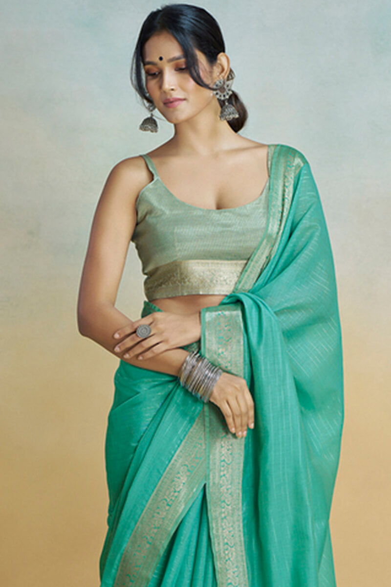 Lustrous Sea Green Cotton Silk Saree With Proficient Blouse Piece