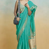 Lustrous Sea Green Cotton Silk Saree With Proficient Blouse Piece