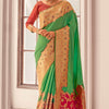 Fugacious Dark Green Soft Banarasi Silk Saree With Opulent Blouse Piece