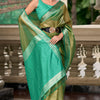 Sumptuous Green Soft Tissue Silk Saree With Gossamer Blouse Piece