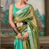 Sumptuous Green Soft Tissue Silk Saree With Gossamer Blouse Piece