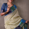 Proficient Beige And Blue Cotton Silk Saree With Engrossing Blouse Piece
