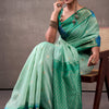Inspiring Turquoise Cotton Silk Saree With Radiant Blouse Piece