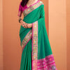 Flamboyant Green Patola Silk Saree with Resplendent Blouse Piece
