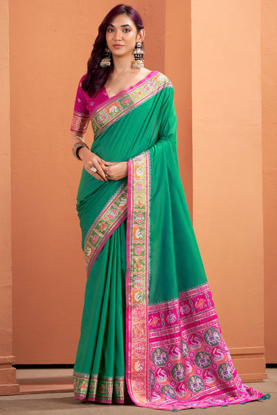 Flamboyant Green Patola Silk Saree with Resplendent Blouse Piece