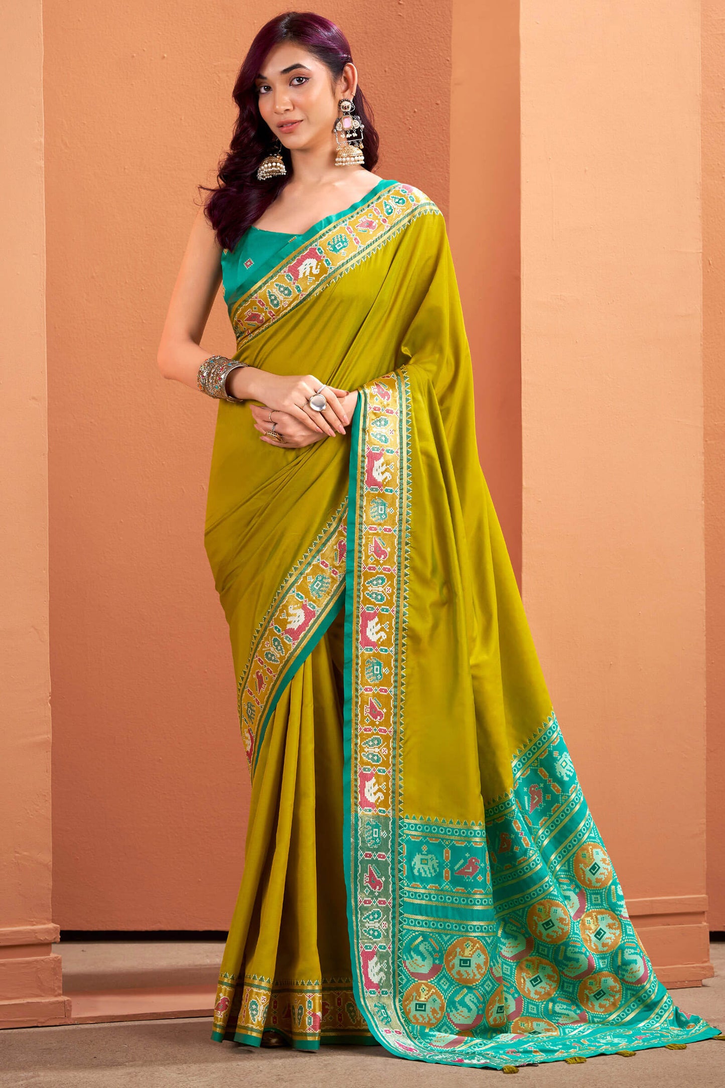 Designer Mustard Patola Silk Saree with Entrancing Blouse Piece