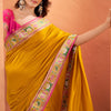 Splendiferous Yellow Patola Silk Saree with Precious Blouse Piece