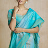 Ravishing Turquoise Soft Banarasi Silk Saree With Ethereal Blouse Piece