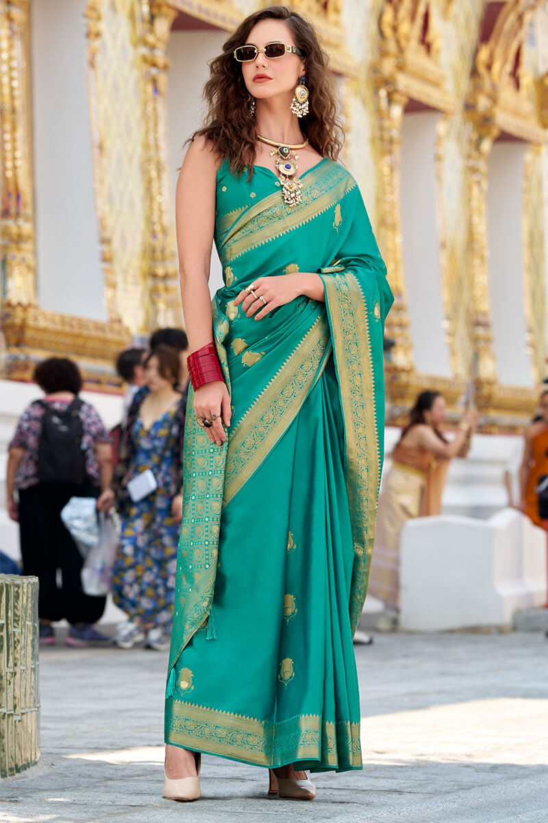 Groovy Turquoise Banarasi Satin Silk Saree With Murmurous Blouse