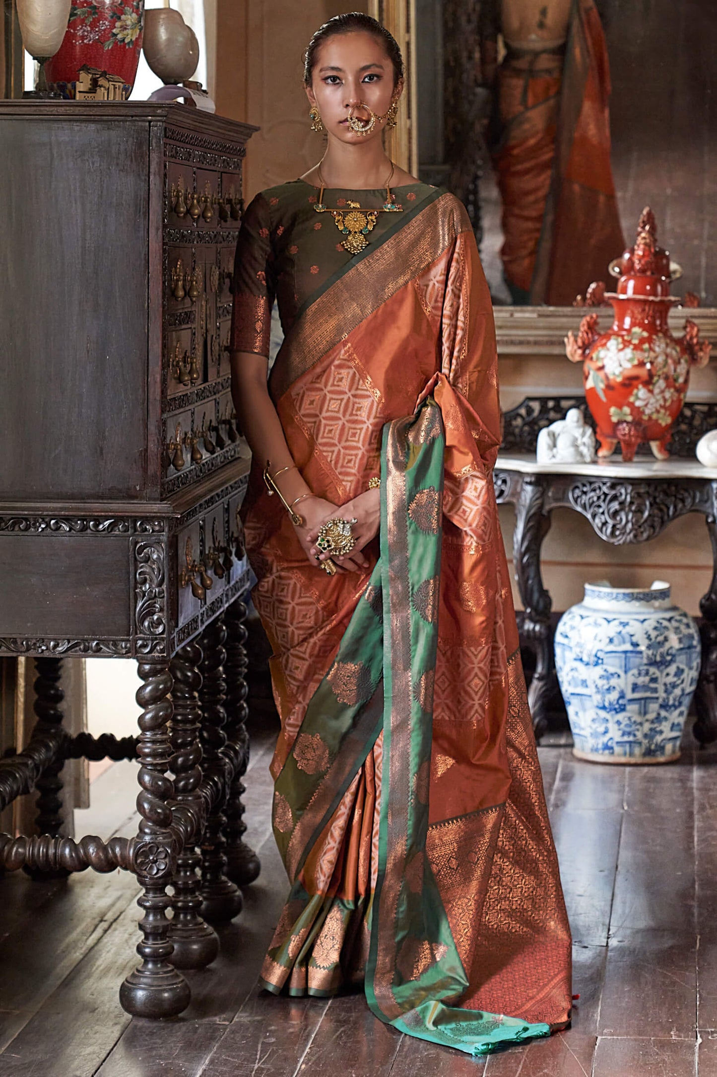 Gossamer Orange Soft Banarasi Silk Saree With Tantalizing Blouse Piece