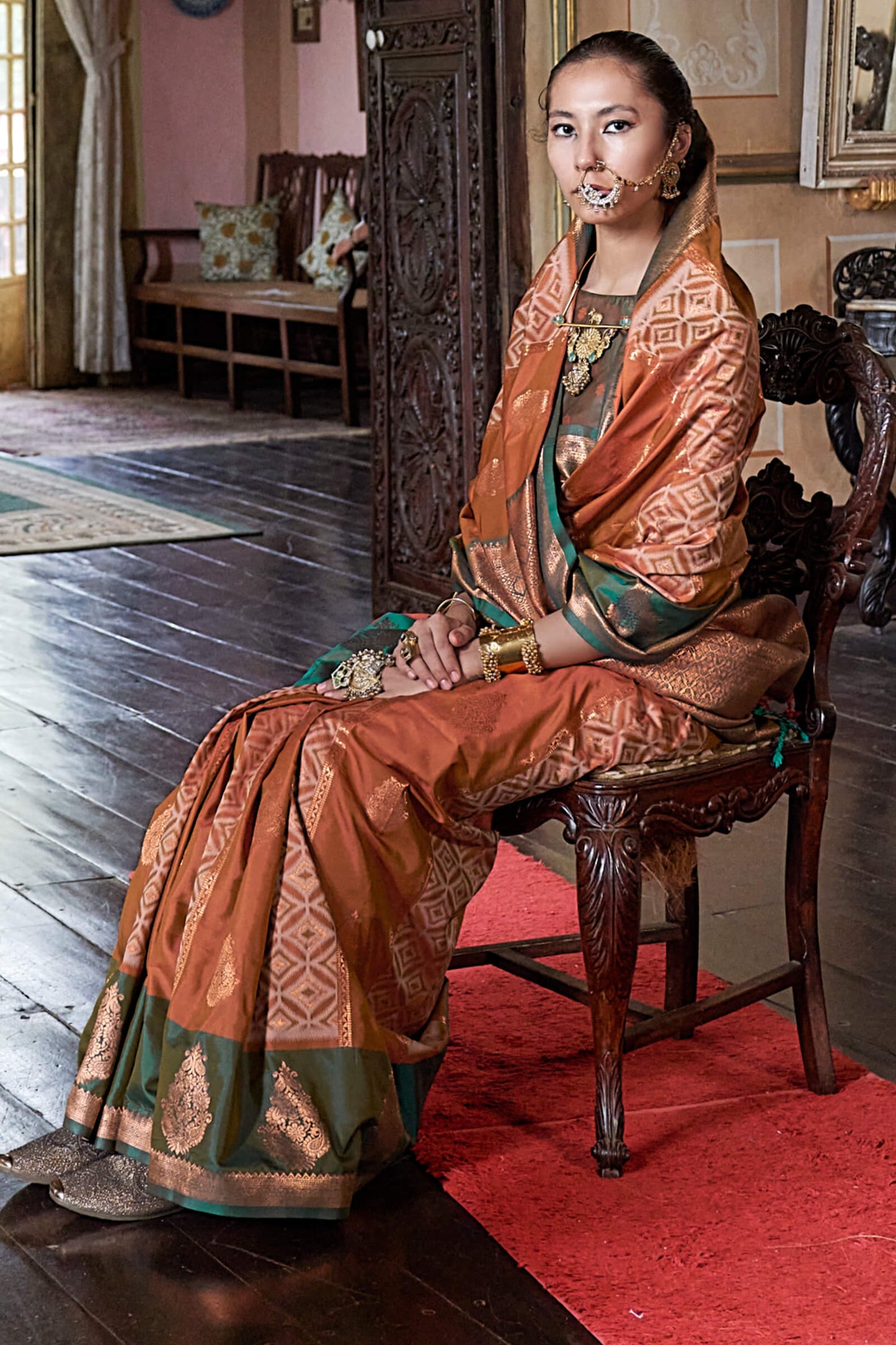 Gossamer Orange Soft Banarasi Silk Saree With Tantalizing Blouse Piece