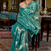 Stunner Turquoise Kanjivaram Silk Saree With Luminous Blouse Piece
