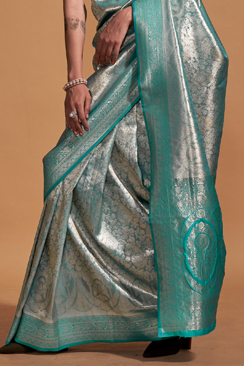 Demure Sea Green Kanjivaram Silk Saree With Ornate Blouse Piece