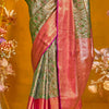 Gratifying Dark Green Kanjivaram Silk Saree With Vibrant Blouse Piece