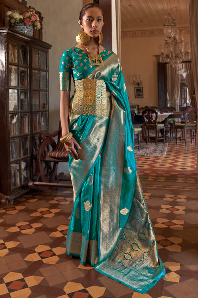 Sonorous Firozi Soft Banarasi Silk Saree With Charismatic Blouse Piece