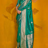 Eloquence Dark Green Soft Banarasi Silk Saree With Propinquity Blouse Piece