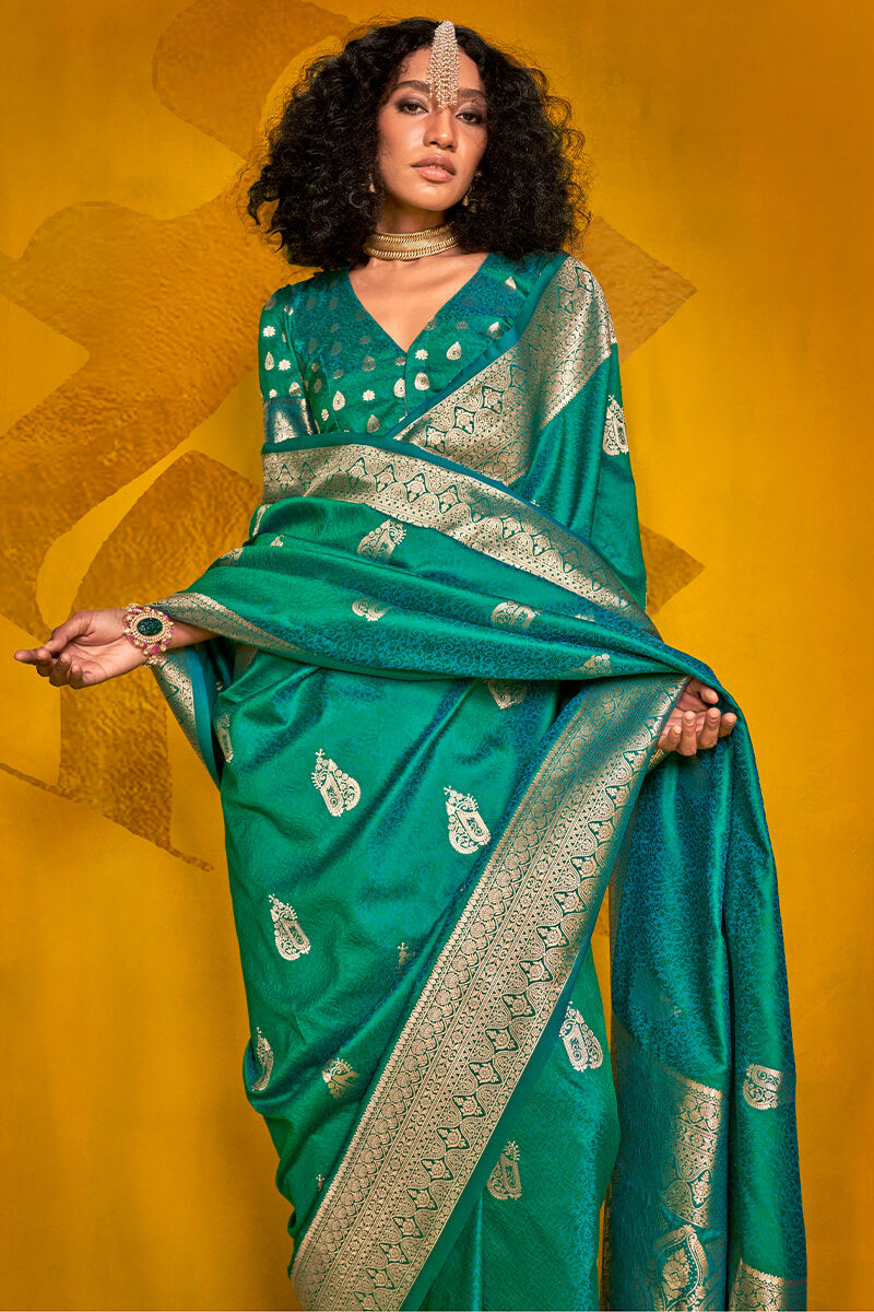 Eloquence Dark Green Soft Banarasi Silk Saree With Propinquity Blouse Piece