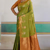 Deserving Green Banarasi Tussar Silk Saree With Magnificat Blouse Piece