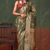 Cynosure Green Paithani Pure Tissue Silk Saree With Bewitching Blouse Piece