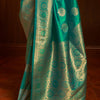 Pleasant Rama Kanjivaram Silk Saree With Ravishing Blouse Piece