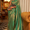 Flattering Green Kanjivaram Silk Saree With Precious Blouse Piece