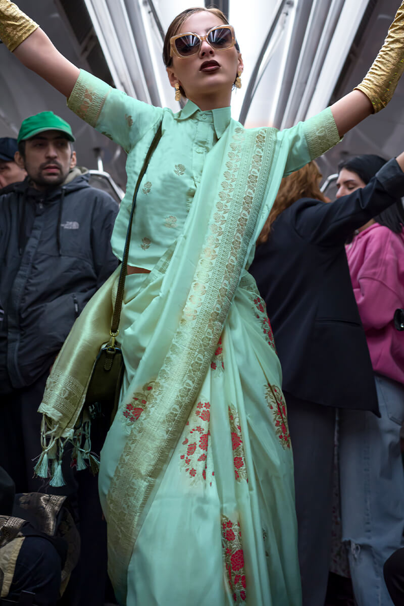 Sonorous Turquoise Soft Banarasi Silk Saree With Grandiose Blouse Piece
