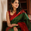 Extraordinary Dark Green Soft Silk Saree With Adorning Blouse Piece