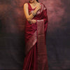 Engrossing Maroon Soft Silk Saree With Inspiring Blouse Piece
