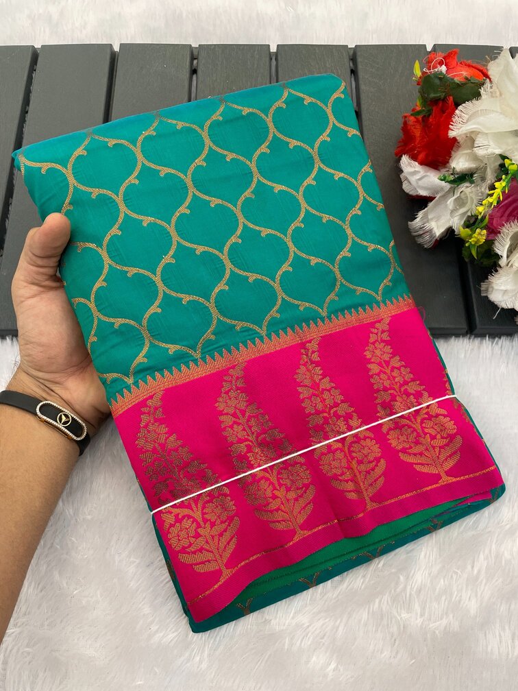 Scintilla Sea Green Soft Banarasi Silk Saree With Confounding Blouse Piece