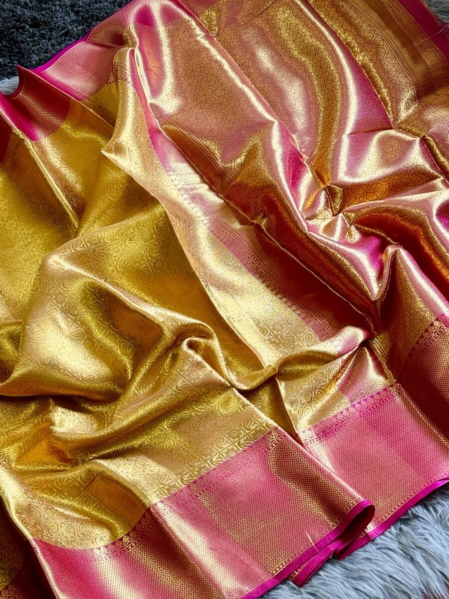Bollywood Style Golden Soft Tissue Silk Saree With Artistic Blouse Piece
