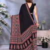 Supernal Black Ajrak Printed Soft Silk Saree With Piquant Blouse Piece
