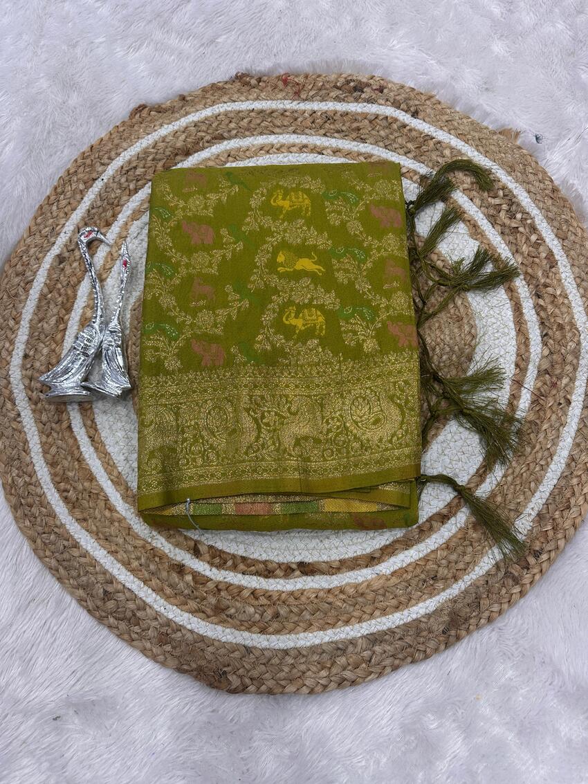 Cynosure Green Soft Banarasi Silk Saree With Precious Blouse Piece