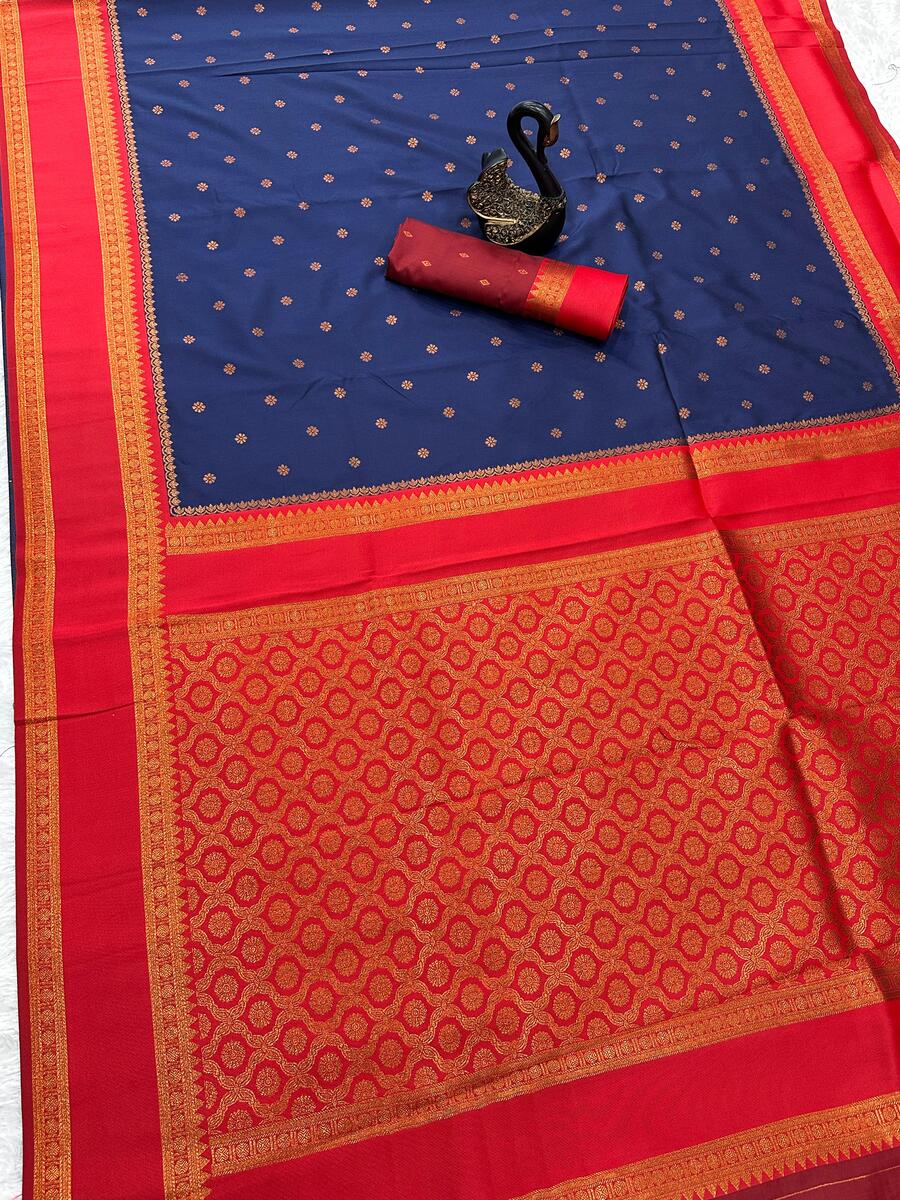 Radiant Navy Blue Soft Banarasi Silk Saree With Fugacious Blouse Piece