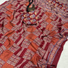 Glamorous Maroon Ajrakh Printed Gajji Soft Silk Saree With Assemblage Blouse Piece