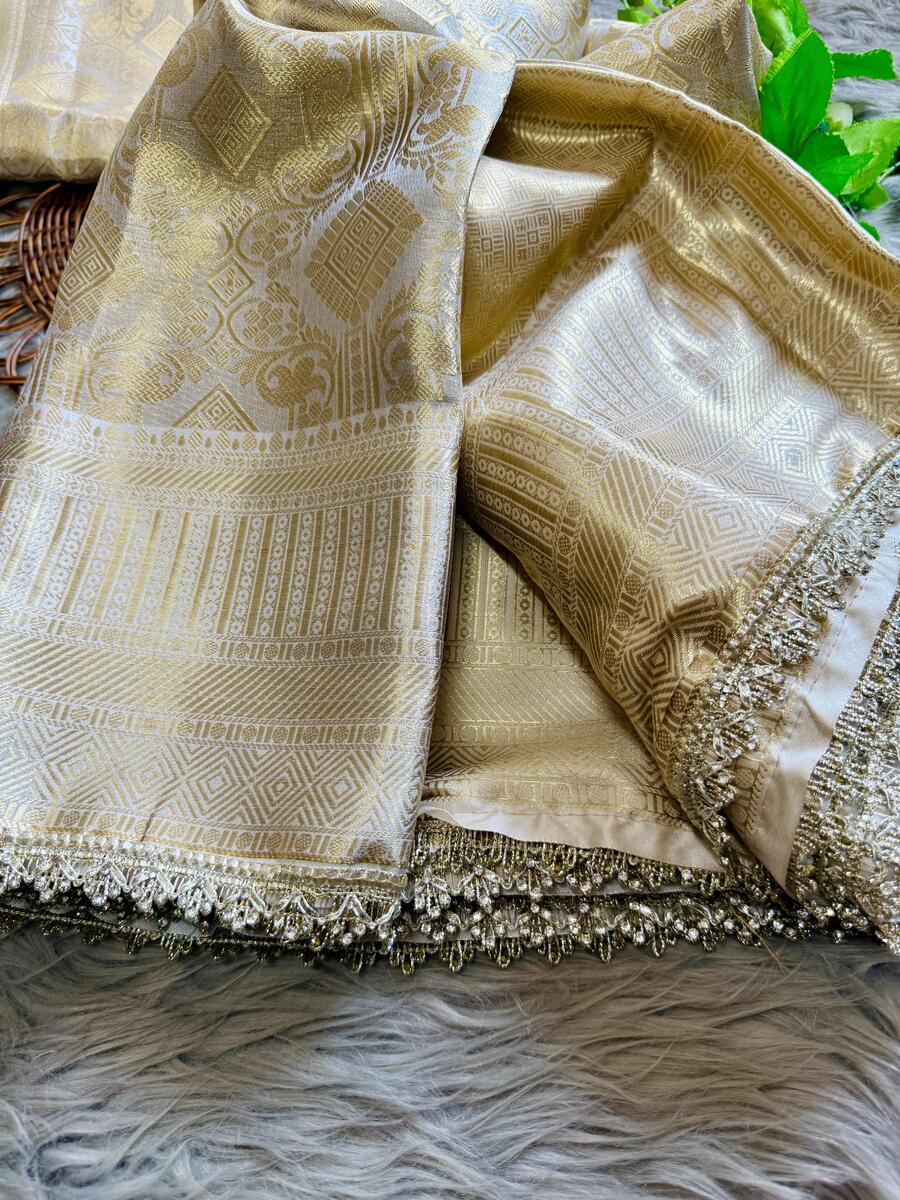 Fancifull Beige Soft Tissue Silk Saree With Classy Blouse Piece