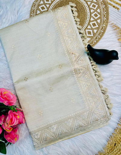 Delightful Off White Embroidery Work Tussar Silk Saree With Inimitable Blouse Piece
