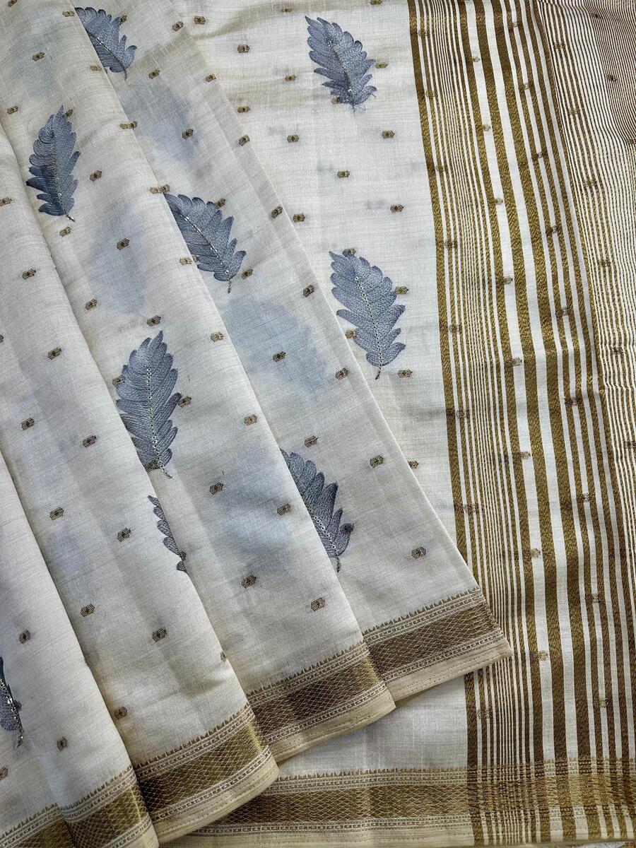 Whimsical Off White Embroidery Work Tussar Silk Saree With Blissful Blouse Piece