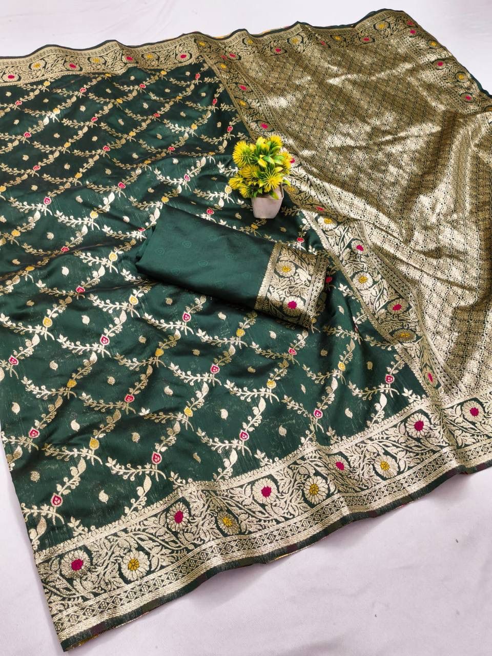 Winsome Dark Green Soft Banarasi Silk Saree With Twirling Blouse Piece