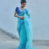 Aqua Blue Net Saree with Blue Floral Embroidery & Scalloped Border