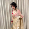 Ivory Organza Saree with Gold Floral Embroidery Border & Red Blouse Piece