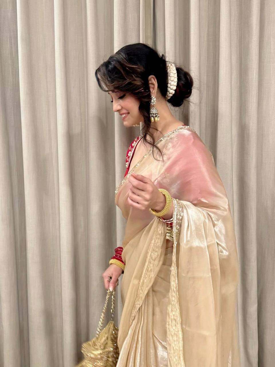 Ivory Organza Saree with Gold Floral Embroidery Border & Red Blouse Piece