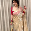 Ivory Organza Saree with Gold Floral Embroidery Border & Red Blouse Piece