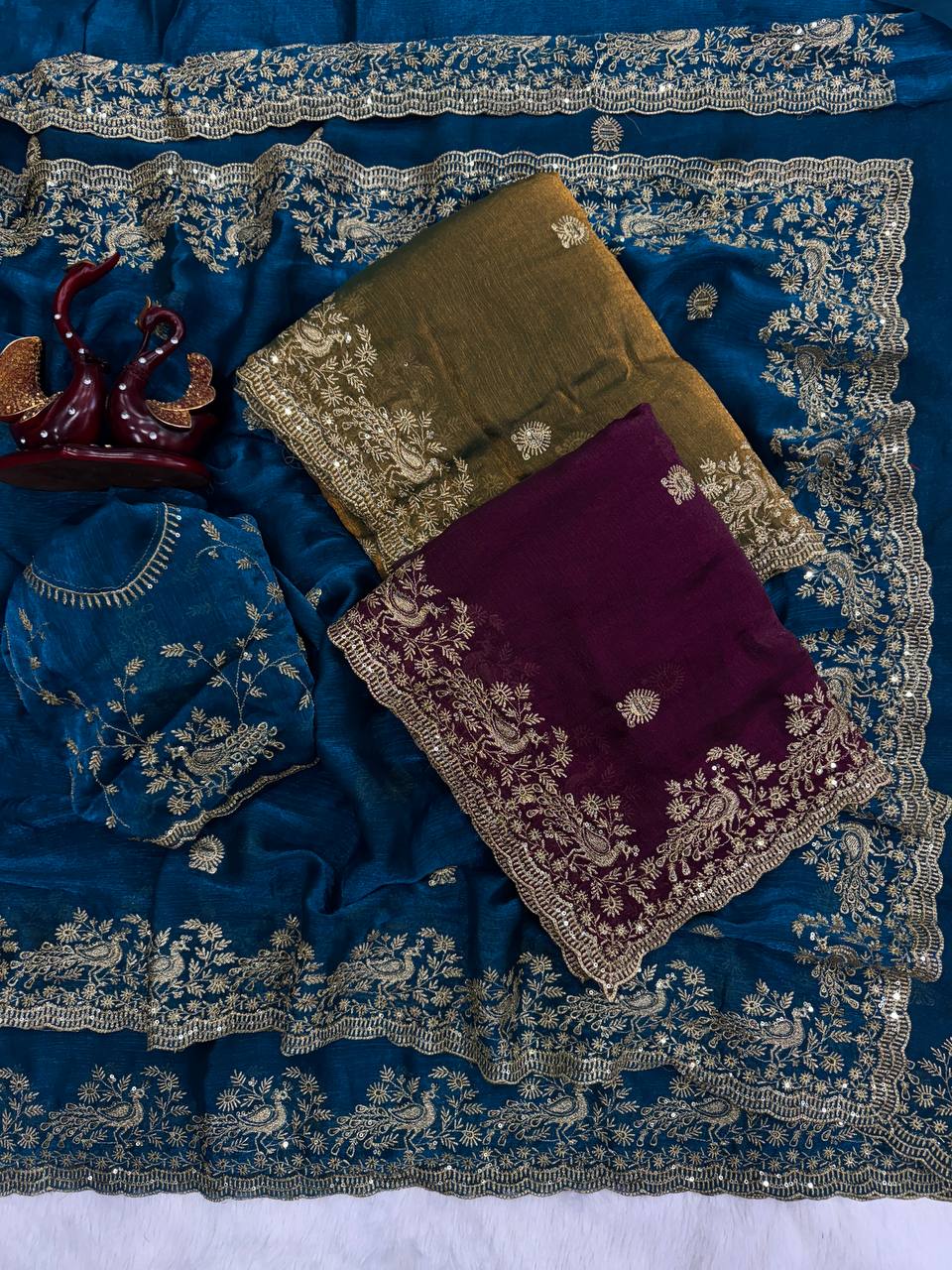 Teal Blue Organza Silk Saree with Heavy Silver Embroidered Border & Designer Blouse