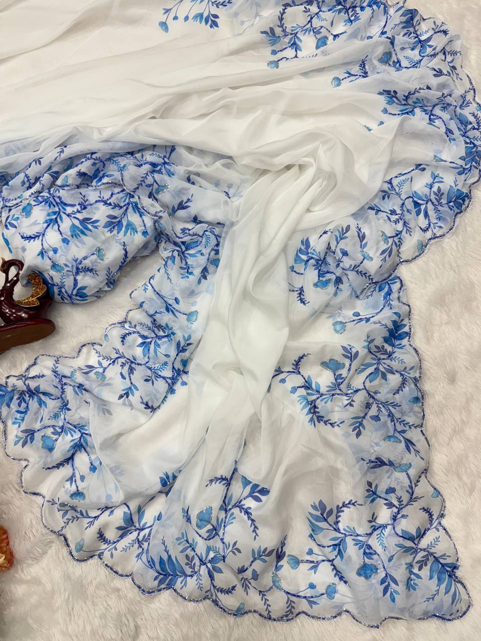 Aqua Blue Net Saree with Blue Floral Embroidery & Scalloped Border