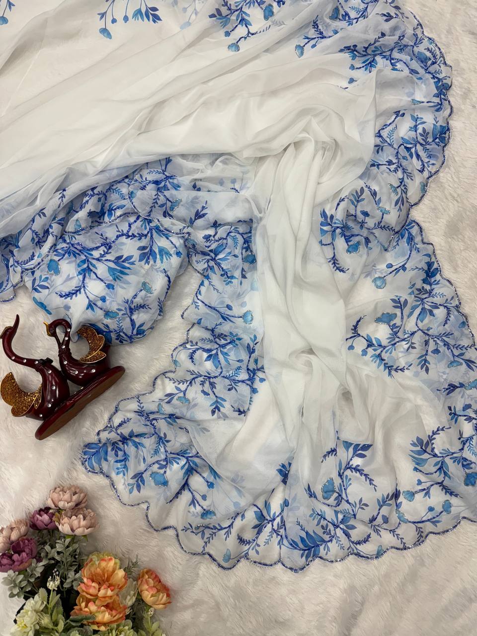 Aqua Blue Net Saree with Blue Floral Embroidery & Scalloped Border