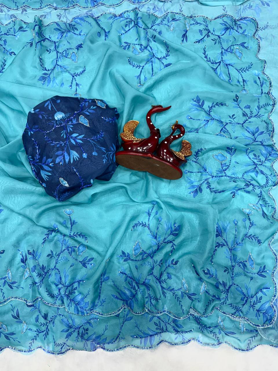 Aqua Blue Net Saree with Blue Floral Embroidery & Scalloped Border