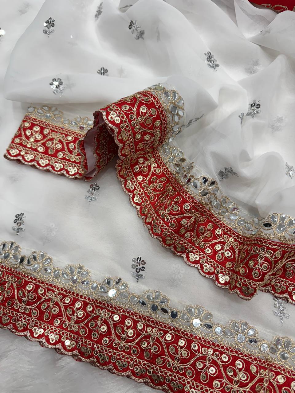 Ivory White Net Saree with Red Embroidered Blouse & Heavy Handwork Border