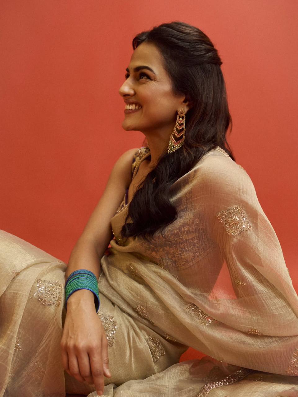 Champagne Gold Chiffon Saree with Silver Zari Booti Work & Ornate Border with Contrast Embroidered Blouse