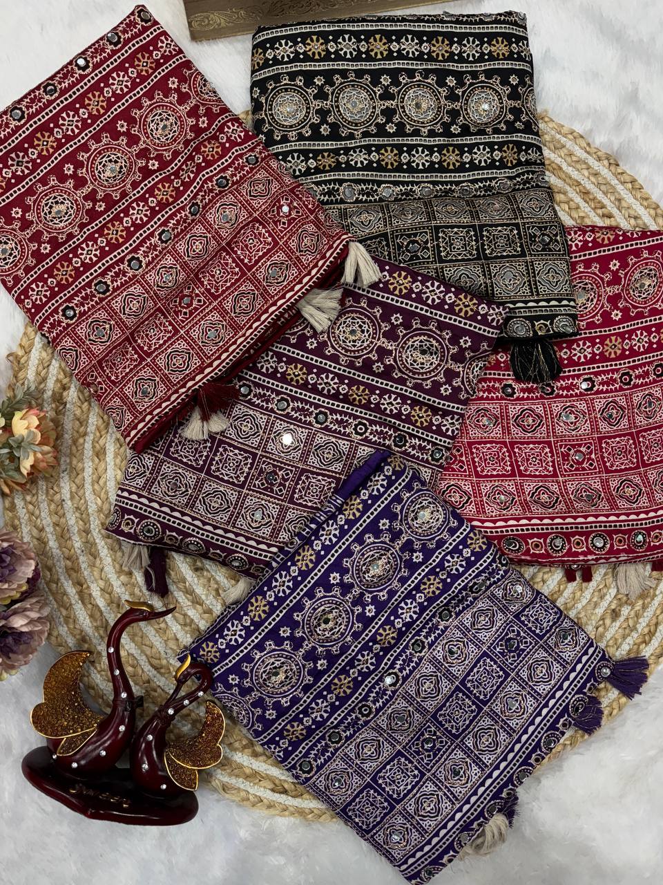 Heritage Ajrakh-Inspired Printed Saree with Mirror Work Detailing & Tassel Accents